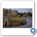 Wegweiser am Ufer